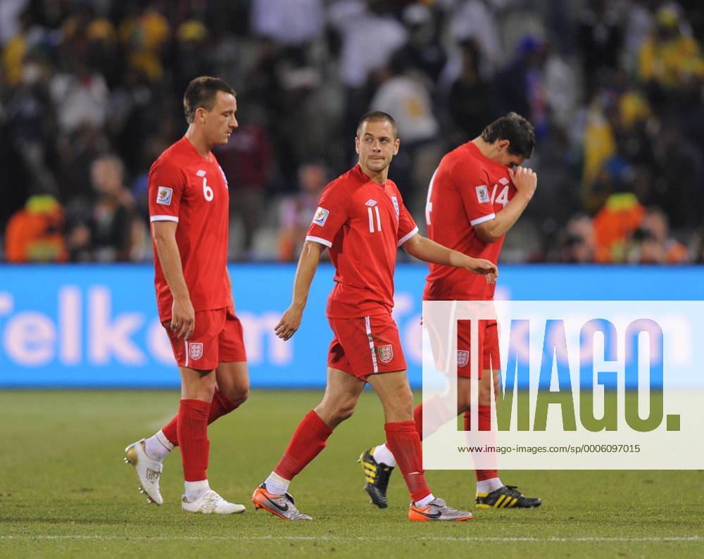 Dejected England players leave the field from left: John Terry, Joe Cole, Gareth Barry - FIFA World Cup 2010 Round of 16 Germany v England (red) - 27th June, 2010 - .