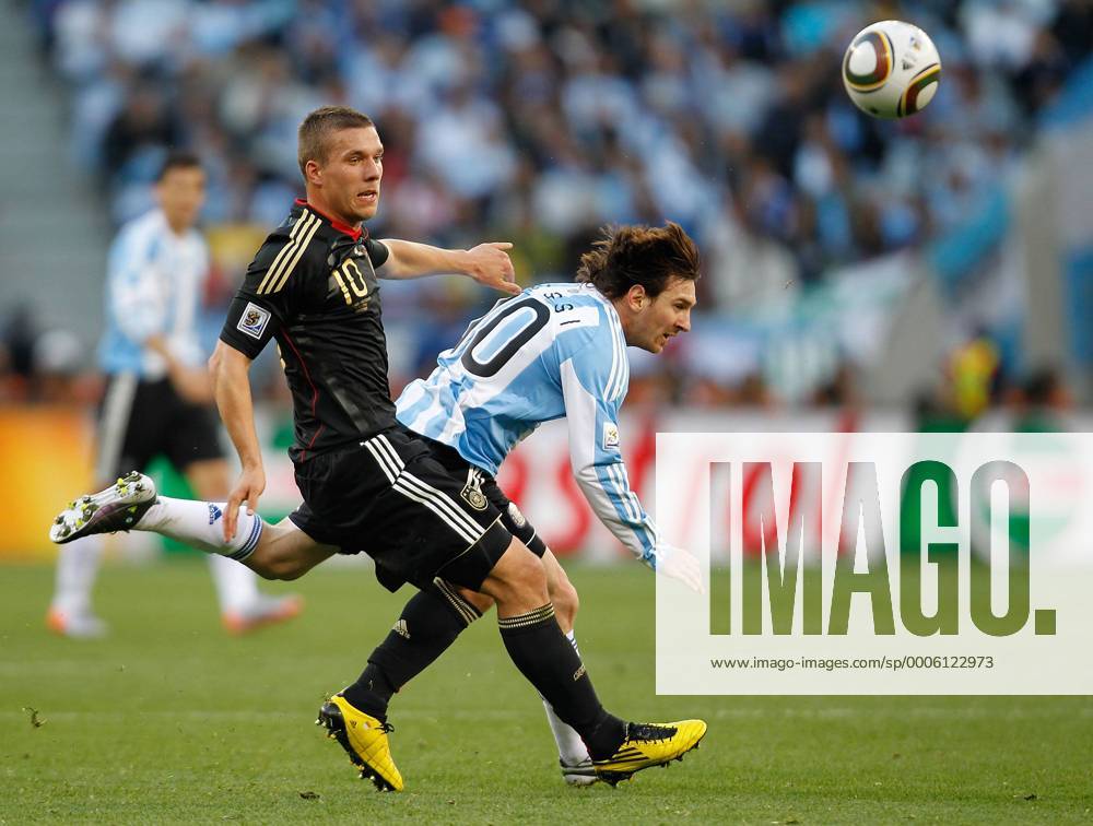 Lukas Podolski(L) of Germany vies with Lionel Messi of Argentina during the 2010 World Cup quarterfinal soccer match between Germany and Argentina in Cape Town on July 3,2010.