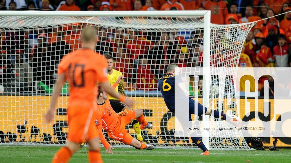 Andres Iniesta of Spain (R) scores a goal during the 2010 FIFA World Cup Final soccer match between Netherlands and Spain at Soccer City Stadium on July 11, 2010 in Johannesburg - - ZUMAgh1