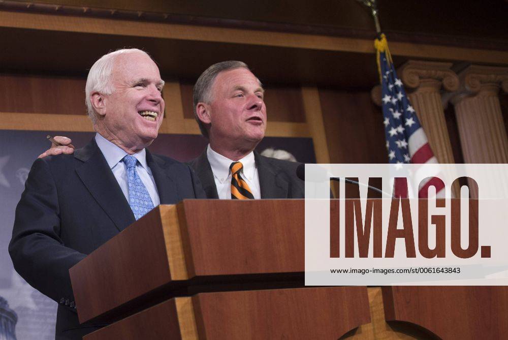 Sen. John McCain (R-AZ) and Sen. Richard Burr (R-NC) joke together during a press conference on the proposed Veterans Affairs bill, on Capitol Hill in Washington, D.C. on June 3, 2014. WAP20140603356