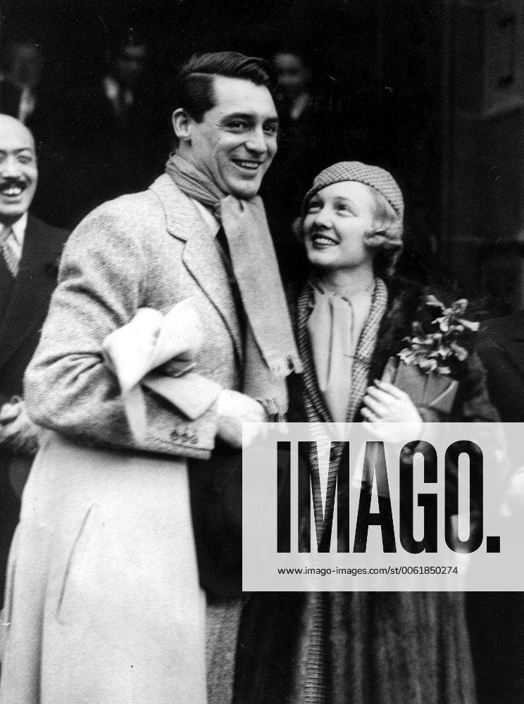 Feb. 9, 1934 - London, England, U.K. - British-born actor CARY GRANT (born Archibald Leach) with VIRGINIA CHERRILL after their wedding in London. Grant escaped his humble Bristol environs and unstable home life by joining an acrobatic troupe, where he became a stilt-walker. Numerous odd jobs kept him going until he tried acting, and, after moving to the United States, he managed to lose his accent, developing a clipped mid-Atlantic speaking style uniquely his own. He was noted as perhaps the foremost exemplar of the debonair leading man, handsome, witty and charming. He was named the second Greatest Male Star of All Time of American cinema by the American Film Institute. London United Kingdom - ZUMAk09