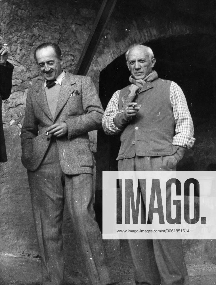 Oct. 27, 1954 - Paris, France - Artist PABLO PICASSO with friend M. RAMIER, in front of the entry to The Pottery of Vallauris. Paris France - ZUMAk09