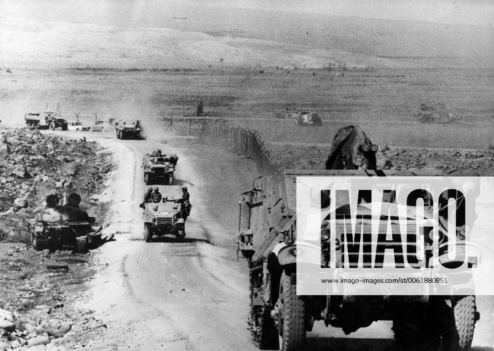 Oct 01, 1973 - Golan Heights, Israel - Also known as the Fourth Arab-Israeli War, Yom Kippur War was fought from October 6 to October 26, 1973 by a coalition of Arab states led by Egypt and Syria against Israel. The war began with a surprise joint attack by Egypt and Syria on the Jewish holiday of Yom Kippur. Egypt and Syria crossed the cease-fire lines in the Sinai and Golan Heights, respectively, which had been captured by Israel in 1967 during the Six-Day War. Many Arab states contributed troops and financial support, and the USSR also provided assistance but ultimately the Arabs buckled under a sustained Israeli counter-attack strengthened by US airlifts. PICTURED: Israeli military column on its way to Syria. Golan Heights Israel - ZUMAk09