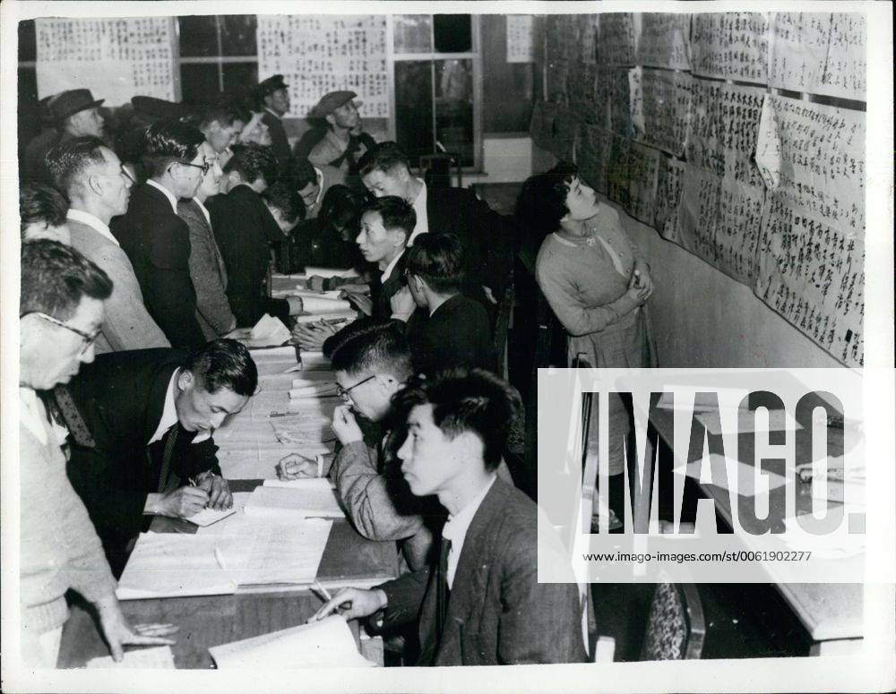Oct. 10, 1954 - Hundreds Die In Japanese Typhoon: Hundreds of people died when the train ferry Toya Maru overturned at Hakodate, Japan, during the recent typhoon. Photo shows The scene as relatives scan the passengers lists - after the disaster. - ZUMAk09