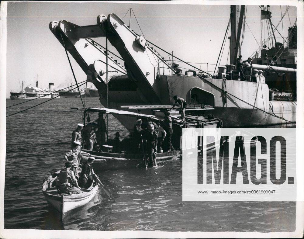 Nov. 11, 1956 - The Middle East Crisis...Naval Drivers at work clearing the canal Block ships: Photo Shows A Navy diver from one of the salvage vessels goes down to start work on clearing the sunken block ships in the Suez Canal. - ZUMAk09