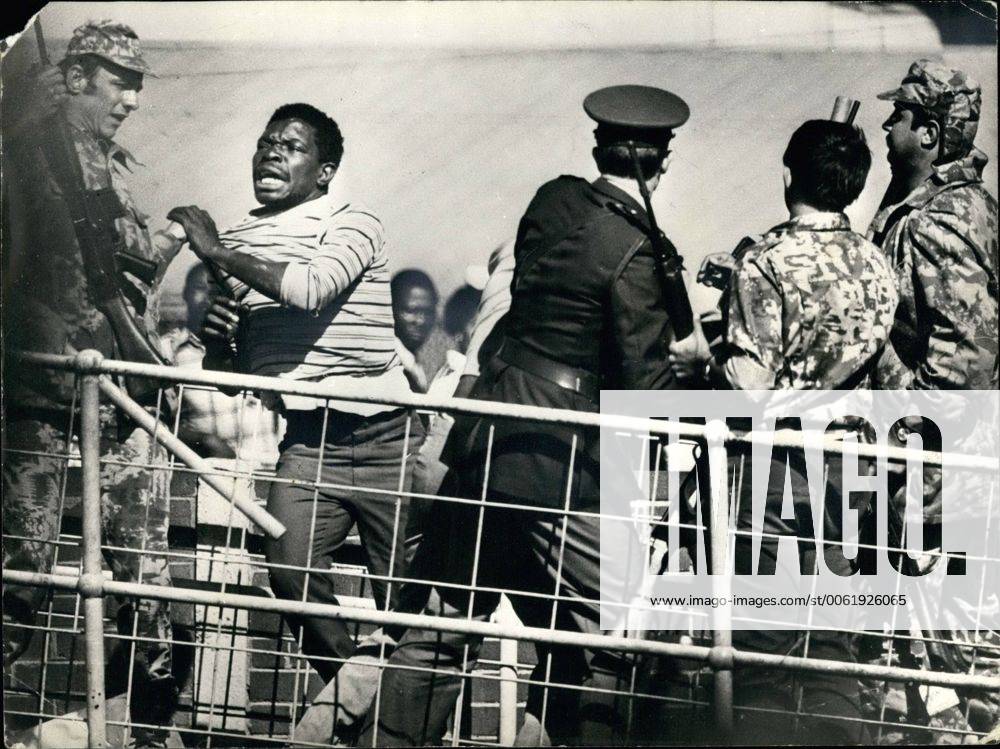 Jun. 06, 1976 - 100 People Killed And More Than 1,000 Injured In South Africa s Worst Outbreak Of Civil Unrest: The worst outbreak of civil unrest in South Africa has claimed the lives of 100 people, and more than 1,000 have been injured in rioting in Soweto, the African township outside Johannesburg. The rioting began during a march by black students protesting against the use of Afrikaans in lessons. Police opened fire and the rioters set fire to buildings and cars. Photo shows Police arresting some of the rioters during the clashed in Soweto. - ZUMAk09