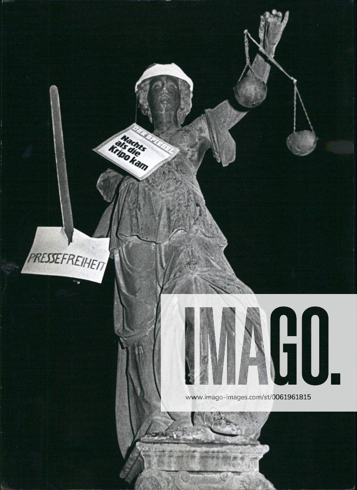 Nov. 11, 1962 - A silent protest against the action taken against the German news magazine Spiegel by german Federal authorities was staged last night in Frankfurt. The statue of Justice, which is on top of a fountain in front of the Frankfurt City Hall, was found holding a new Spiegel -frontpage and a sign saying Freedom of Press smashed on her sword. - ZUMAk09