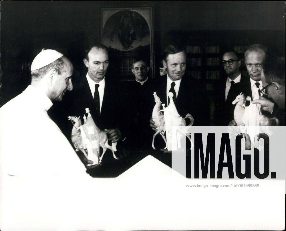 Oct. 18, 1969 - The Pope Meets the American Lunarauts: During their visit to Rome, the three American lunarauts, Neil Armstrong, Col. Edwin Aldrin and Col. Michael Collins met the Pope during a private audience at the Vatican. Photo shows Pope Paul presents the three American lunnarauts (L. to R.) Michael Collins, Neil Armstrong and Edwin Aldrine, with statues of the Three Wise Men. - ZUMAk09