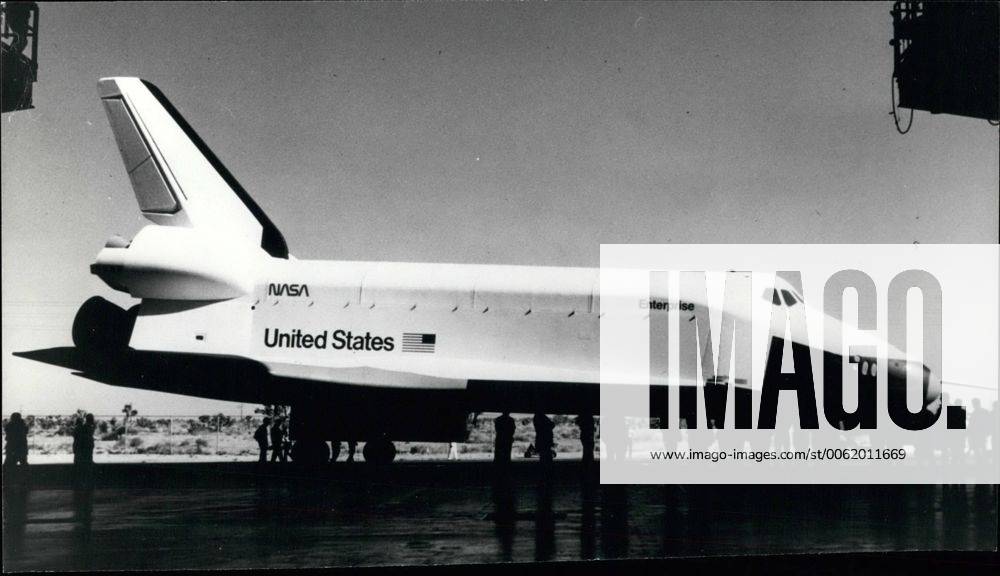 Dec. 12, 1976 - Shuttle Orbiter 101 Rollout. Photo Shows: A ground level view of the Space shuttle orbiter 101 Enterprise during rollout activity at the Rockwell International Space Division s Orbiter manufacturing facility at Palmdale in California. The Enterprise will be moved to the NASA Dryden Elight Research centre 35 miles north of Palmdale, where it will undergo tests flights in the atmosphere in 1977. Those flights will be the prelude to Shuttle Orbiter flights into Earth orbit in 1979 by the second Orbiter (102), now under construction. - ZUMAk09