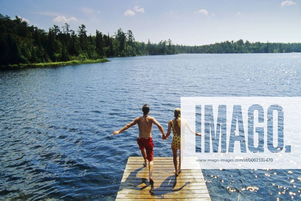 Jumping off dock, Lyons Lake, Whiteshell Provincial Park, Manitoba, Canada. acp12019 DavexReede