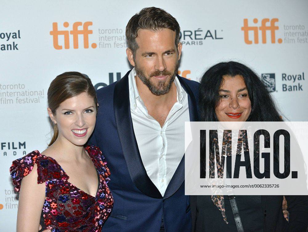 (L-R) Anna Kendrick , Ryan Reynolds and director Marjane Satrapi arrive at the Toronto International Film Festival premiere of The Voices at Ryerson Theatre in Toronto, Canada on September 11, 2014. TOR2014091112
