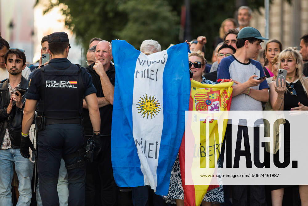 Javier Milei president of Argentina visits Madrid, Spain - 21 Jun 2024 People hold a flag of Argentina and Spain, at the Madrid Casino before the arrival of Javier Milei, president of Argentina, to receive the award from the Juan de Mariana association at the Freedom Dinner . The Argentine president Javier Milei traveled to Spain personally to receive the International medal from the Community of Madrid and receive the award from the Juan de Mariana association at the Freedom Dinner . Madrid Spain