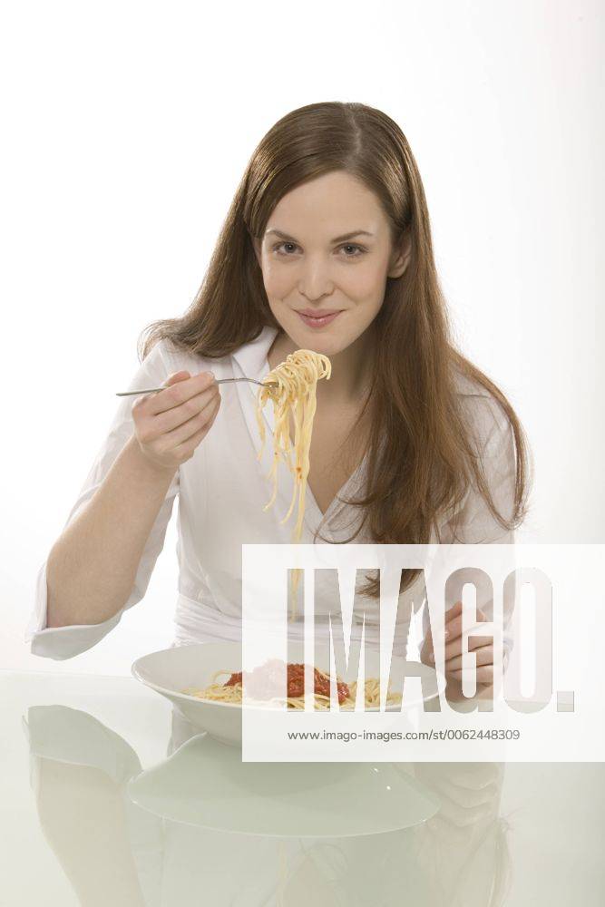 Woman eating noodles, portrait model released CLF00379
