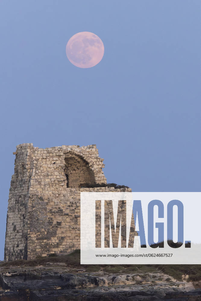 Strawberry Moon In Italy The full moon rises behind over the Tower of Roca Vecchia in Roca Vecchia, Lecce, Italy, on June 21, 2024. Roca Italy