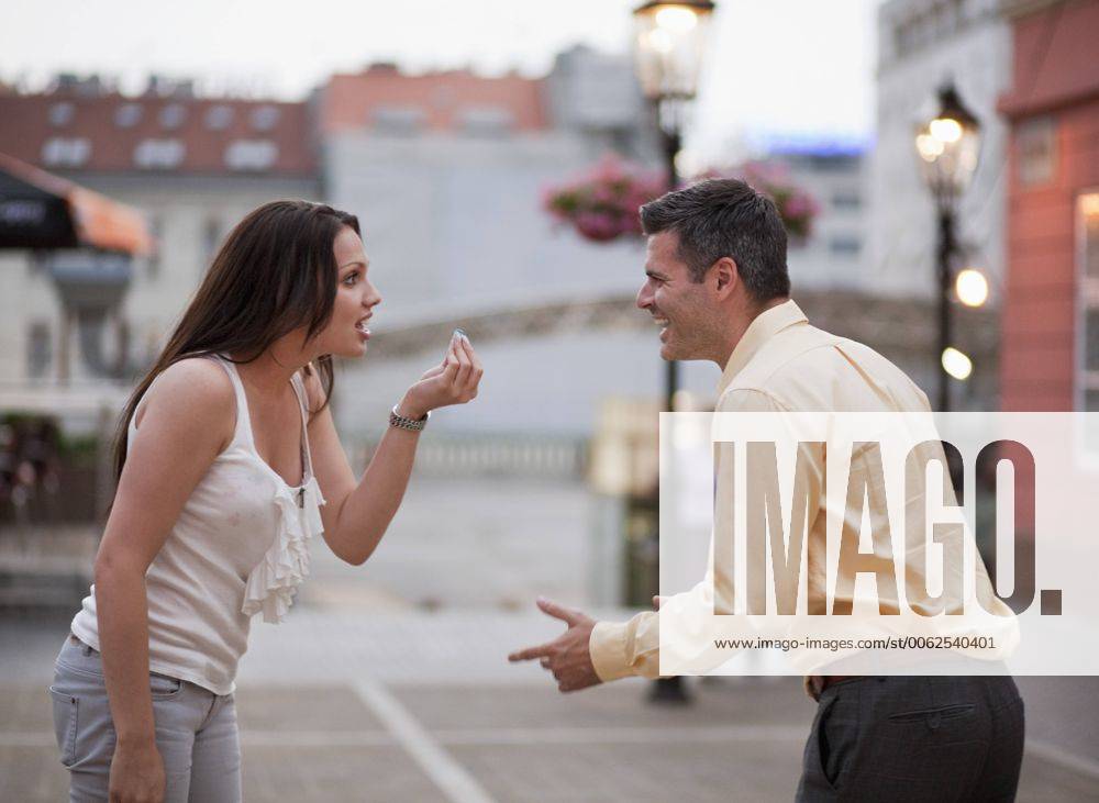 Croatia, Zagreb, Woman and man arguing on street model released HSIF000121