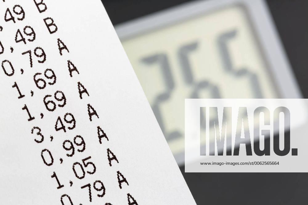 Shopping receipt with calculator, close up EJWF000174