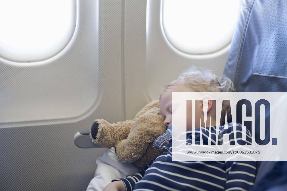 Germany, Boy sleeping in plane model released RBF000907