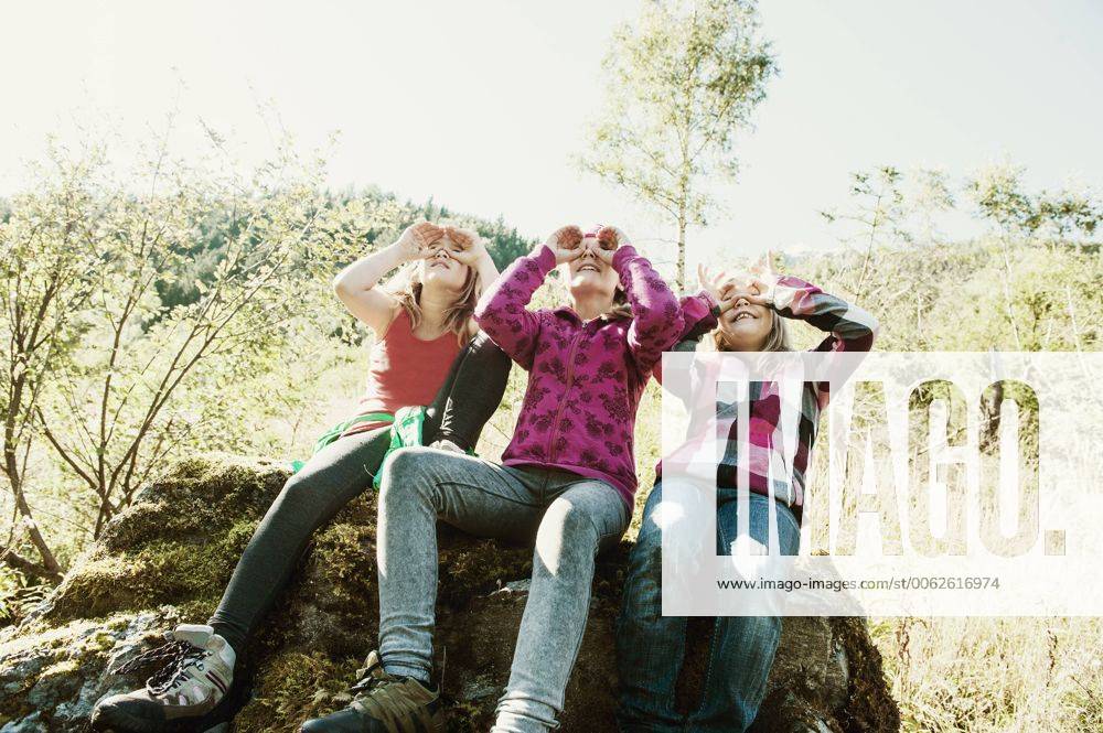 Three girls exploring the nature model released HHF004809