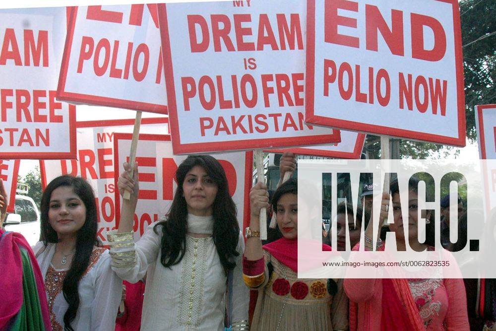 Pakistani women hold placards during a rally to mark World Polio Day in eastern Pakistan s Lahore on Oct. 24, 2014. World Health Organization said Friday that three more polio cases have surfaced in Pakistan, bringing the number of new cases to 220, a record figure that authorities blame on attacks by insurgents targeting vaccination teams. )(zhf) PAKISTAN-LAHORE-POLIO DAY-RALLY Sajjad