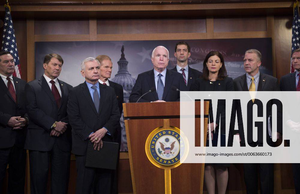 Chairman of the Senate Armed Services Committee John McCain (R-AZ) is flanked by a group of bipartisan Senators as he speaks on arming the Ukrainians against Russia, at a news conference on Capitol Hill in Washington, D.C. on February 5, 2015. WAP20150205318 KEVINxDIETSCH