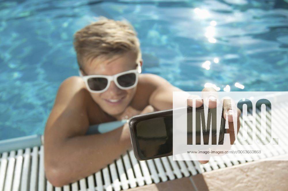 Close-up teenager boy swimming pool self-portrait mit_2003_02397