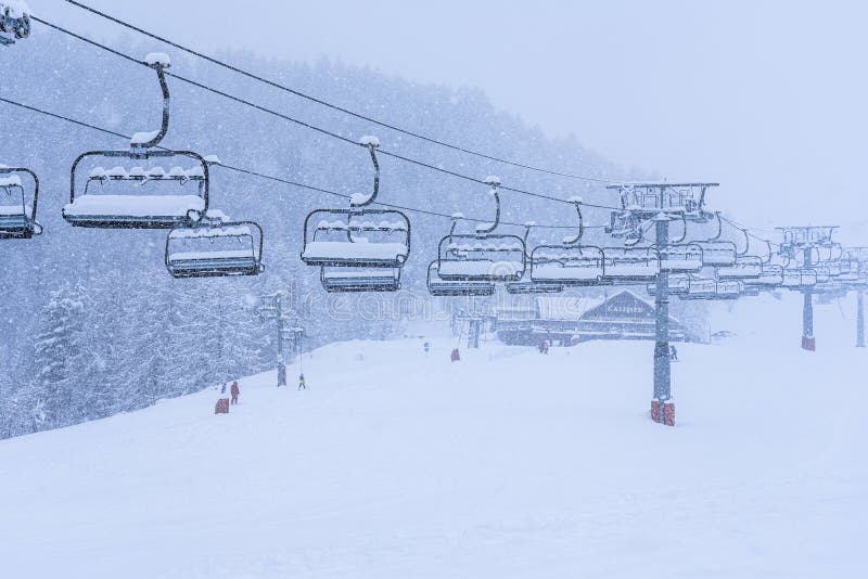 Auron, France 01.01.2021 Empty ski slopes and ski lifts. During the winter holidays of 2020 December and 2021 January, Auron, France 01.01.2021 Empty ski slopes and ski lifts. During the winter holidays of 2020 December and 2021 January lifts are closed for skiing for adults during to the coronavirus pandemic.