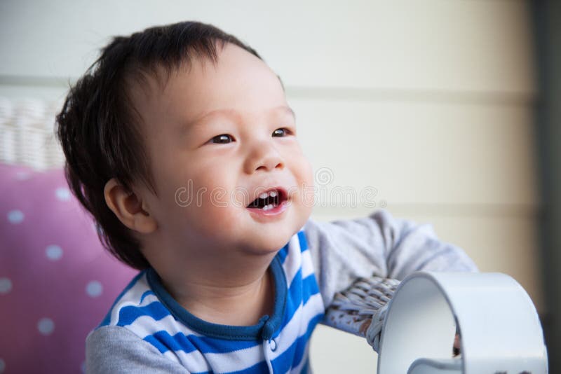 Cute baby boy on sofa, Cute baby boy smile on sofa model released