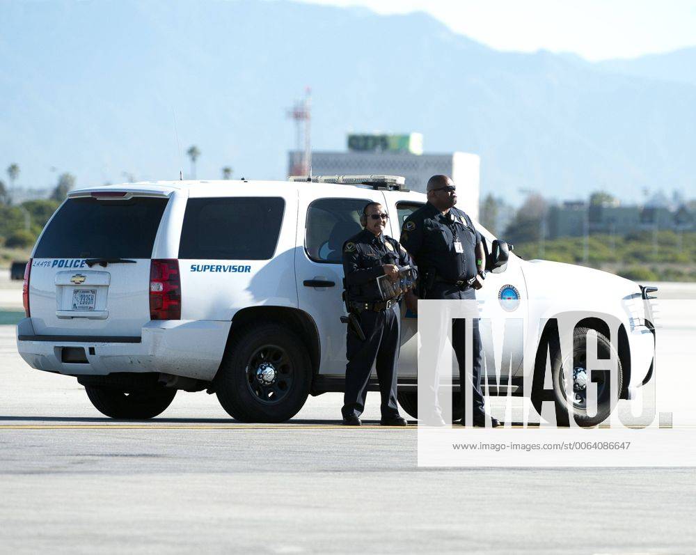 Los Angeles, California, U.S - Los Angeles International Airport Police is made up of more than 1,100 law enforcement officers, security and staff. Beginning in 1946, the LAX AIrport Police is the largest LEO dedicated to 24 hour security services.------LAX Airport Police stand by along the flightline at LAX. Los Angeles U.S. - ZUMAb102