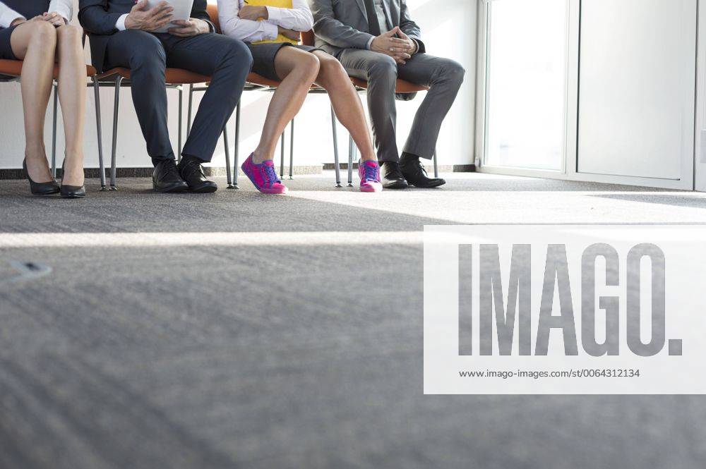 People sitting in a row, waiting for job interview model released Symbolfoto property released WESTF020942