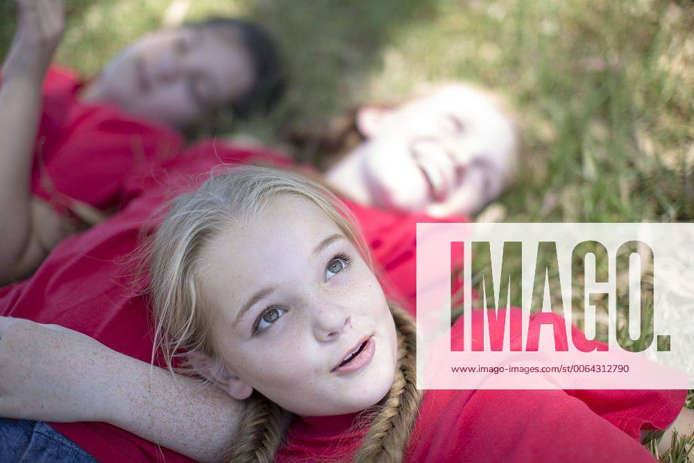 South Africa, Kids on field trip taking a break, girl day dreaming model released Symbolfoto ZEF003926