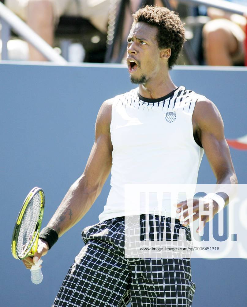Gael Monfils of France country man Richard Gasquet during fourth-round action at the U.S. Open held at the National Tennis Center on September 6, 2010 in New York. NYP20100906312