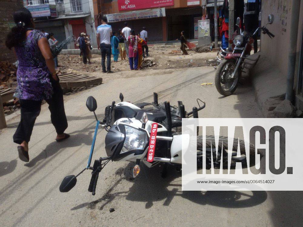 (150512) -- KATHMANDU, May 12, 2015 -- A motorcycle is seen lying on the ground after an earthquake in Kathmandu, Nepal, May 12, 2015. A 7.5-magnitude earthquake struck Nepal at 3:05 p.m. Tuesday (Beijing Time), the China Earthquake Networks Center said. ) NEPAL-KATHMANDU-EARTHQUAKE SunilxSharma