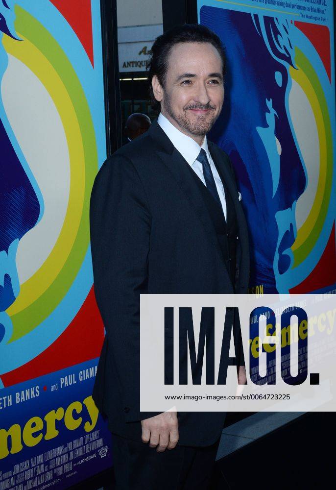 Cast member John Cusack attends the premiere of the biographical motion picture drama Love & Mercy at the Academy of Motion Picture Arts & Sciences (AMPAS) in Beverly Hills, California on June 2, 2015. Storyline: In the 1960s, Beach Boys leader Brian Wilson struggles with emerging psychosis as he attempts to craft his avant-garde pop masterpiece. In the 1980s, he is a broken, confused man under the 24-hour watch of shady therapist Dr. Eugene Landy. LAP2015060247 JIMxRUYMEN