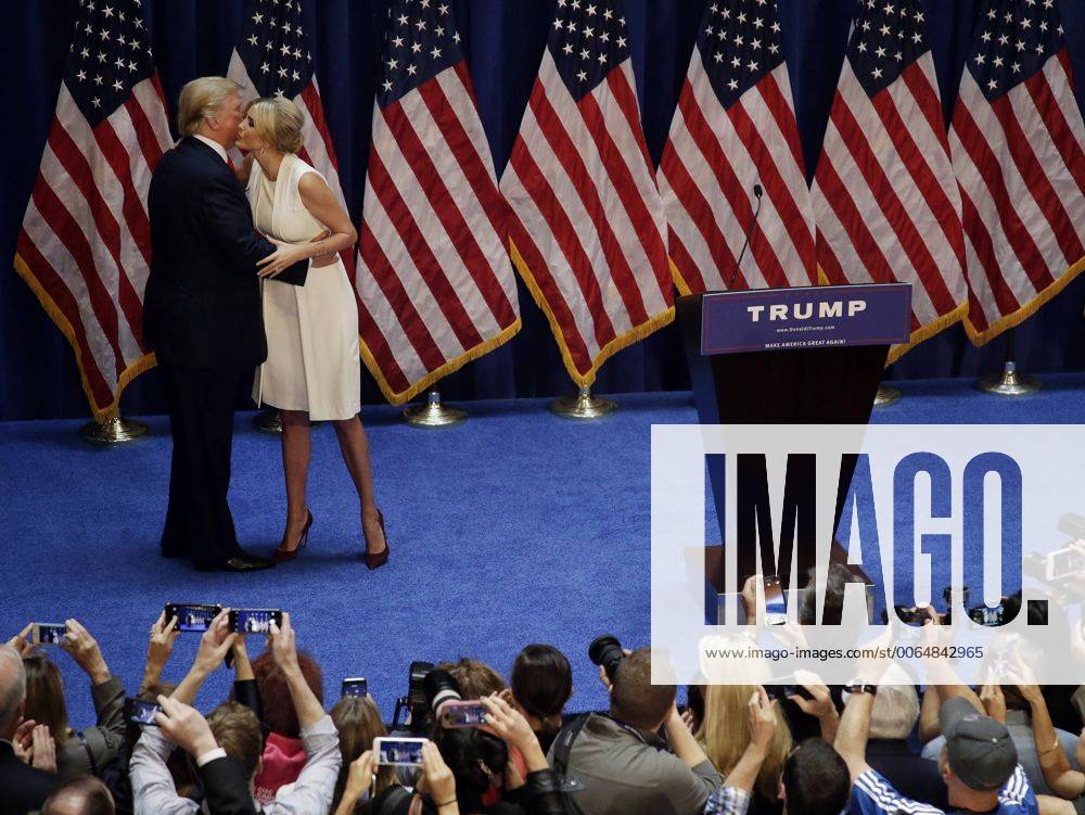 Donald Trump is greeted by daughter Ivanka before he speaks to supporters and media announcing he will be running for President of the United States at Trump Tower on 5th Avenue in New York City on June 16, 2015. Trump is the 12th Republican running for the White House. NYP20150616105 JOHNxANGELILLO