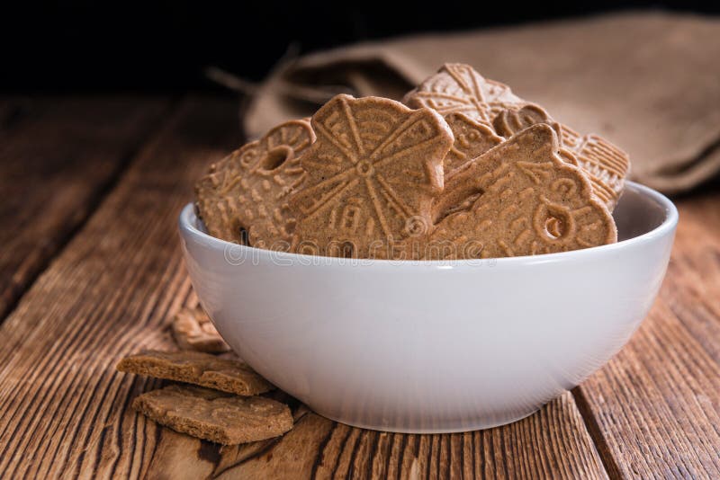 Heap of fresh baked Spekulatius, Heap of fresh baked Spekulatius (German cuisine) on wooden background