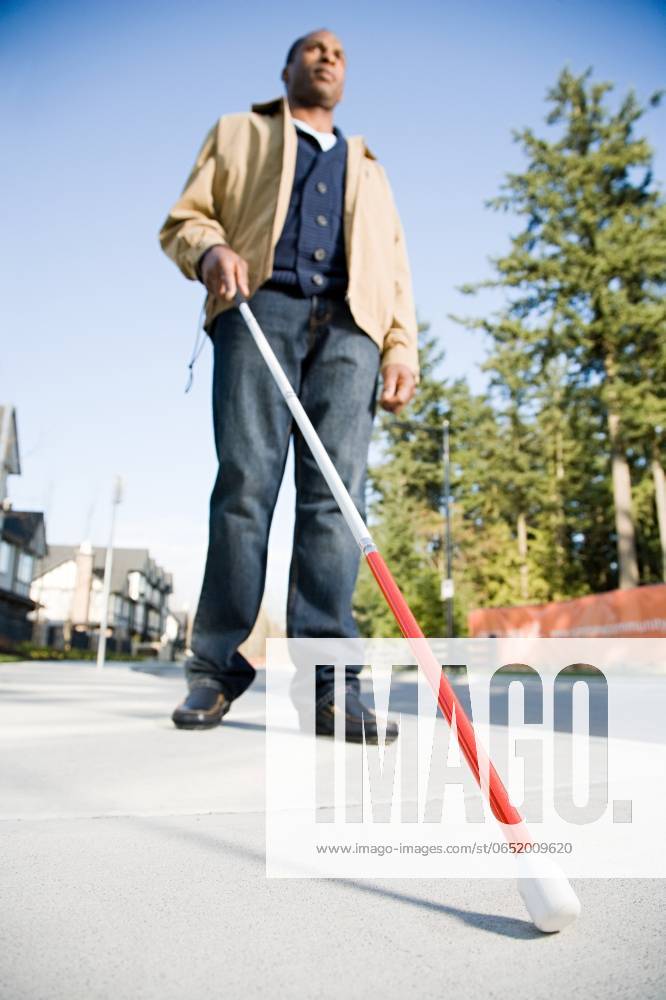 Blind man using a walking stick ,model released, Symbolfoto; Blinde Mann anhand einer Spazierengehen kleben ,model released, Symbolfoto ING_39829_12722 RECORD DATE NOT STATED