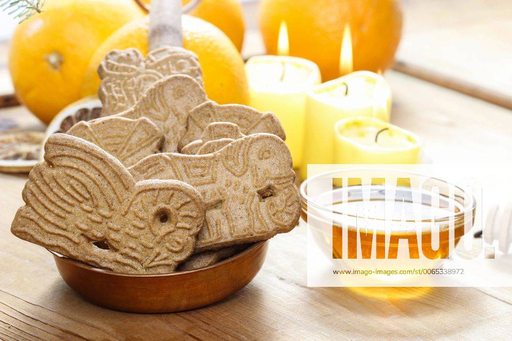 Speculaas is a type of spiced shortcrust biscuit, traditionally baked before St Nicholas feast in the Netherlands, Belgium and Northern France and around Christmas in Germany.