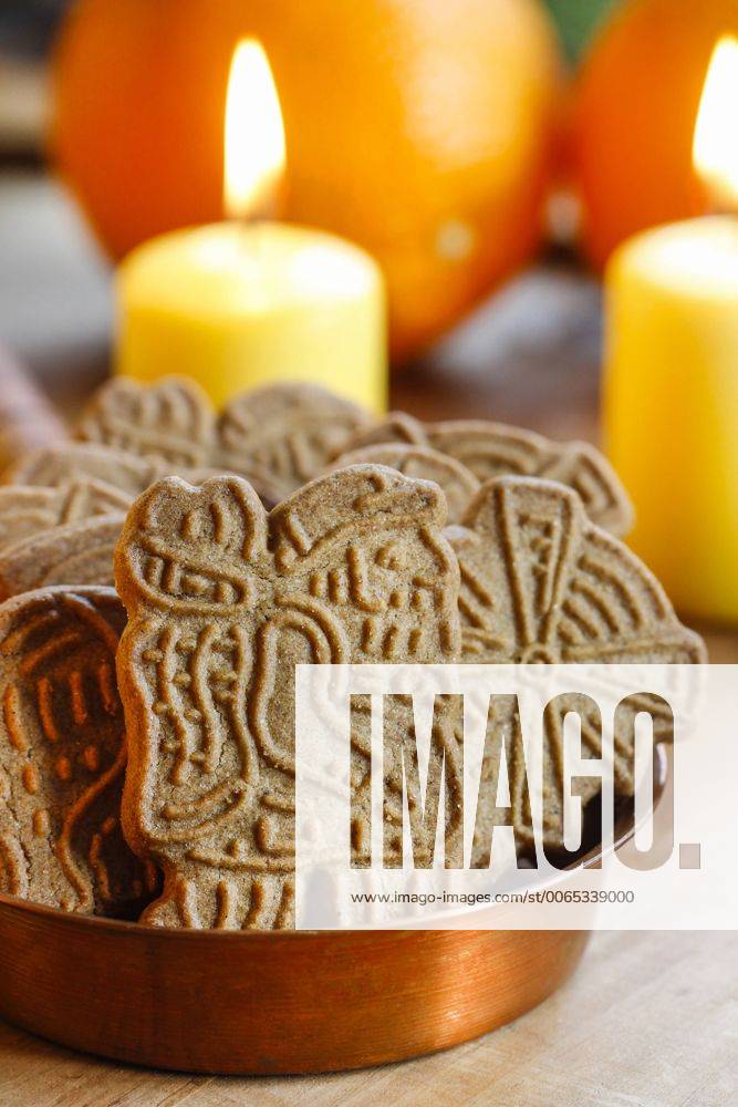 Speculaas is a type of spiced shortcrust biscuit, traditionally baked before St Nicholas feast in the Netherlands, Belgium and Northern France and around Christmas in Germany.