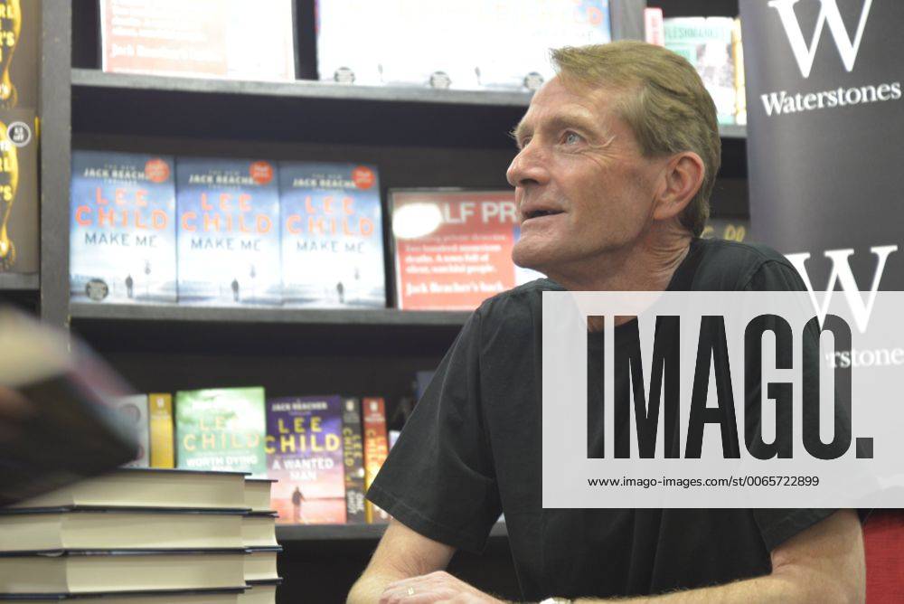 Manchester, England - Author Lee Child signing a book for one of his fans in Manchester, England, on Monday 14th September 2015. Manchester England - ZUMAn230