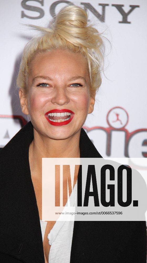 Dec. 7, 2014 - New York, New York, U.S. - Singer SIA attends the world premiere of Annie held at the Ziegfeld Theater. - ZUMAk03