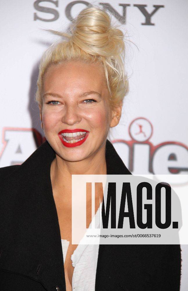 Dec. 7, 2014 - New York, New York, U.S. - Singer SIA attends the world premiere of Annie held at the Ziegfeld Theater. - ZUMAk03
