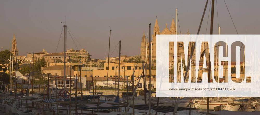 Spain, balearic islands, mallorca, palma de mallorca panoramic view of the cathedral across the port.