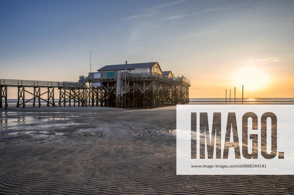 Germany, Schleswig-Holstein, St. Peter-Ording, Empty pier at sunset, FRF01040