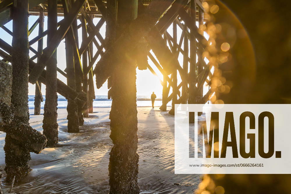 Germany, Schleswig-Holstein, St. Peter-Ording, Underside of pier at sunset model released, Symbolfoto, FRF01041