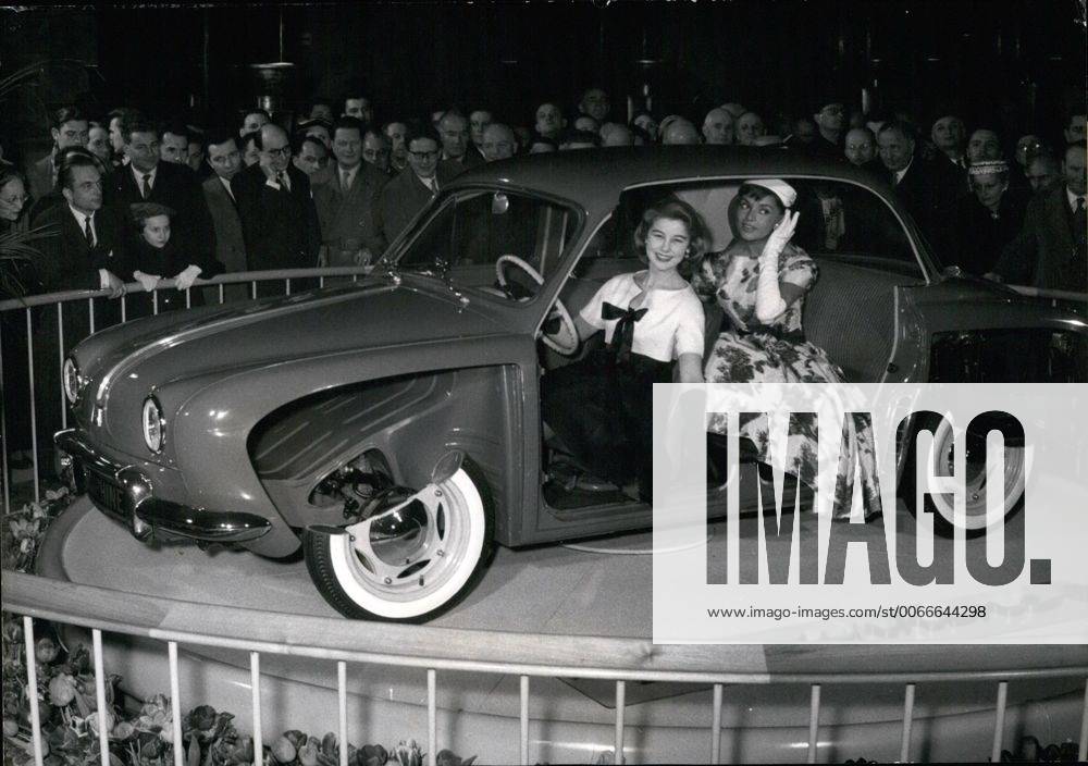 1965 - Renault presents new car: Dauphine Dauphine, the latest achievementà of Renault Motor Works was presented to the press this morning. OPS: Two Paris Mannequins presenting the new car. March 7 56 - ZUMAk09_