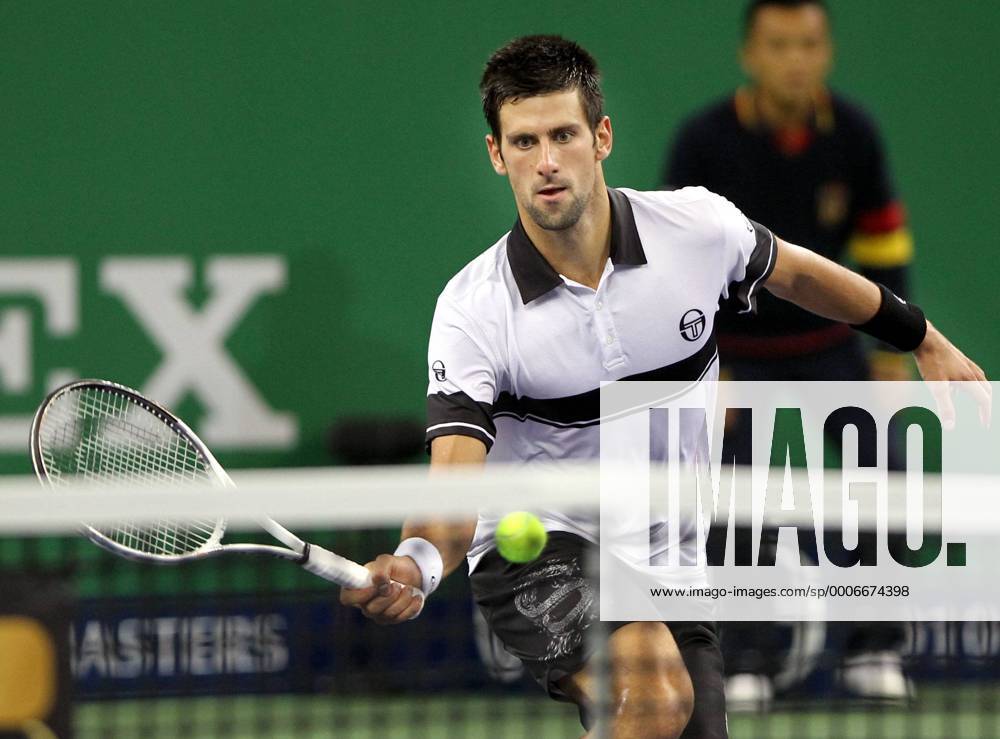 Novak Djokovic of Serbia hits a return during the third round match of the Shanghai Masters ATP tennis tournament in Shanghai, China