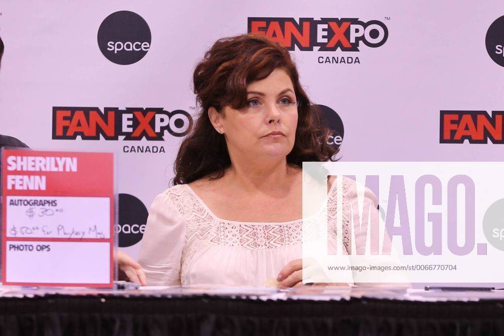 Aug. 30, 2014 - Toronto, Ontario, Canada - Actress SHERILYN FENN signs autographs for $30 or will sign her December 1990 s playboy spread for $50 at Toronto Fan Expo 2014, held in the Metro Toronto Convention Centre. - ZUMAs10