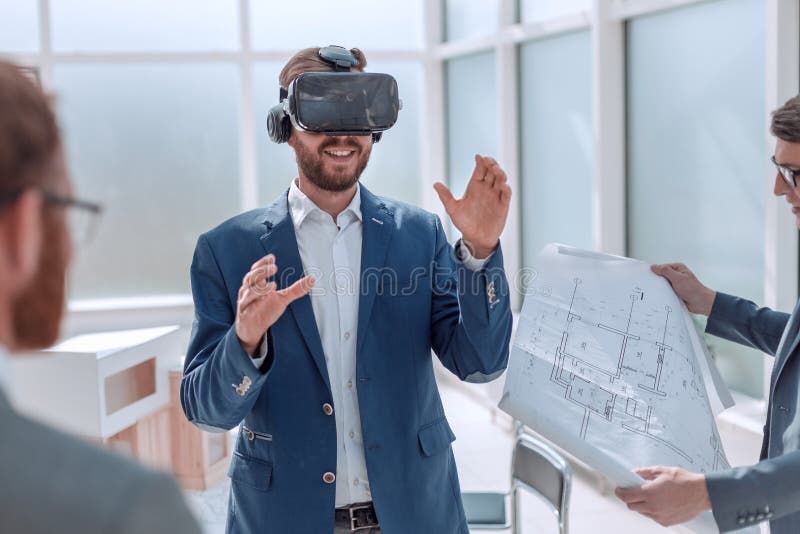 Architect using virtual reality glasses in the workplace., Close up. architect using virtual reality glasses in the workplace.