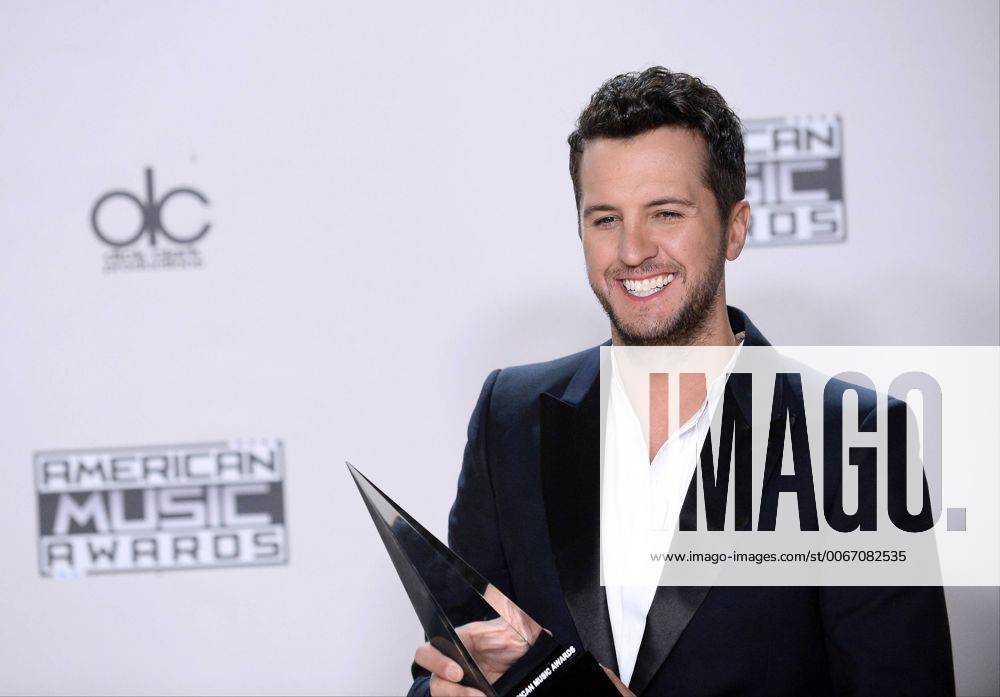 Recording artist Luke Bryan, winner of Favorite Country Male Artist, appears backstage during the 43rd annual American Music Awards held at Microsoft Theater in Los Angeles on November 22, 2015. LAP20151122414 JIMxRUYMEN