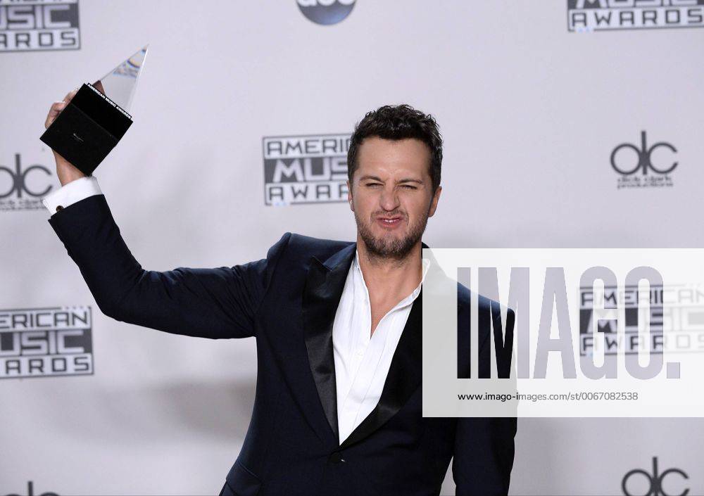 Recording artist Luke Bryan, winner of Favorite Country Male Artist, appears backstage during the 43rd annual American Music Awards held at Microsoft Theater in Los Angeles on November 22, 2015. LAP20151122415 JIMxRUYMEN